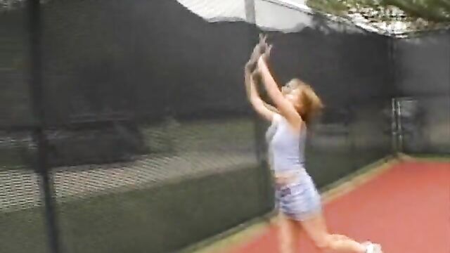 Sasha Knox on a tennis court
